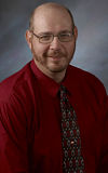 Dr. Hesse smiling.