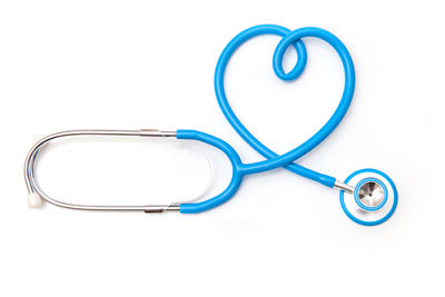 Stethoscope on a table, wrapped like a heart