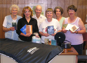 Horn Hospice Group smiling. There is five females and one male.