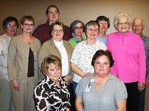 Volunteer Group smiling.