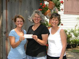 Board Members Terri Carstensen, Deb Einspahr, and Sarah Harm